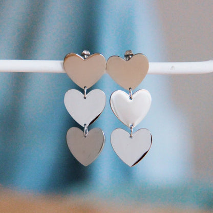 SO775: Statement oorbel 3 hartjes – zilver